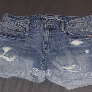 Mid rise ripped jean shorts